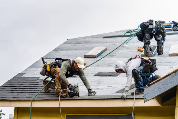 Professional Roofing technician working in Massapequa, NY